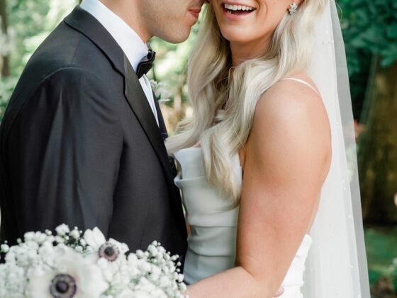 Bride and groom bridal portraits in Crystal Plaza's garden.