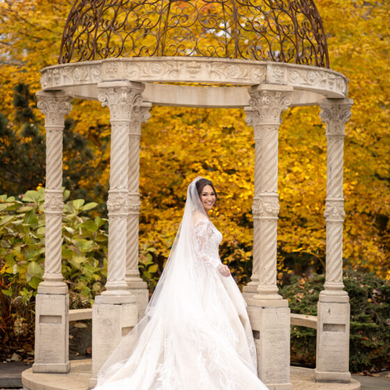 Fall bride wedding photography in Crystal Plaza's garden.