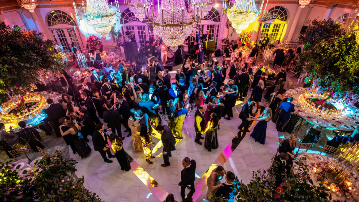 Lively dance floor in Crystal Plaza's grand ballroom.