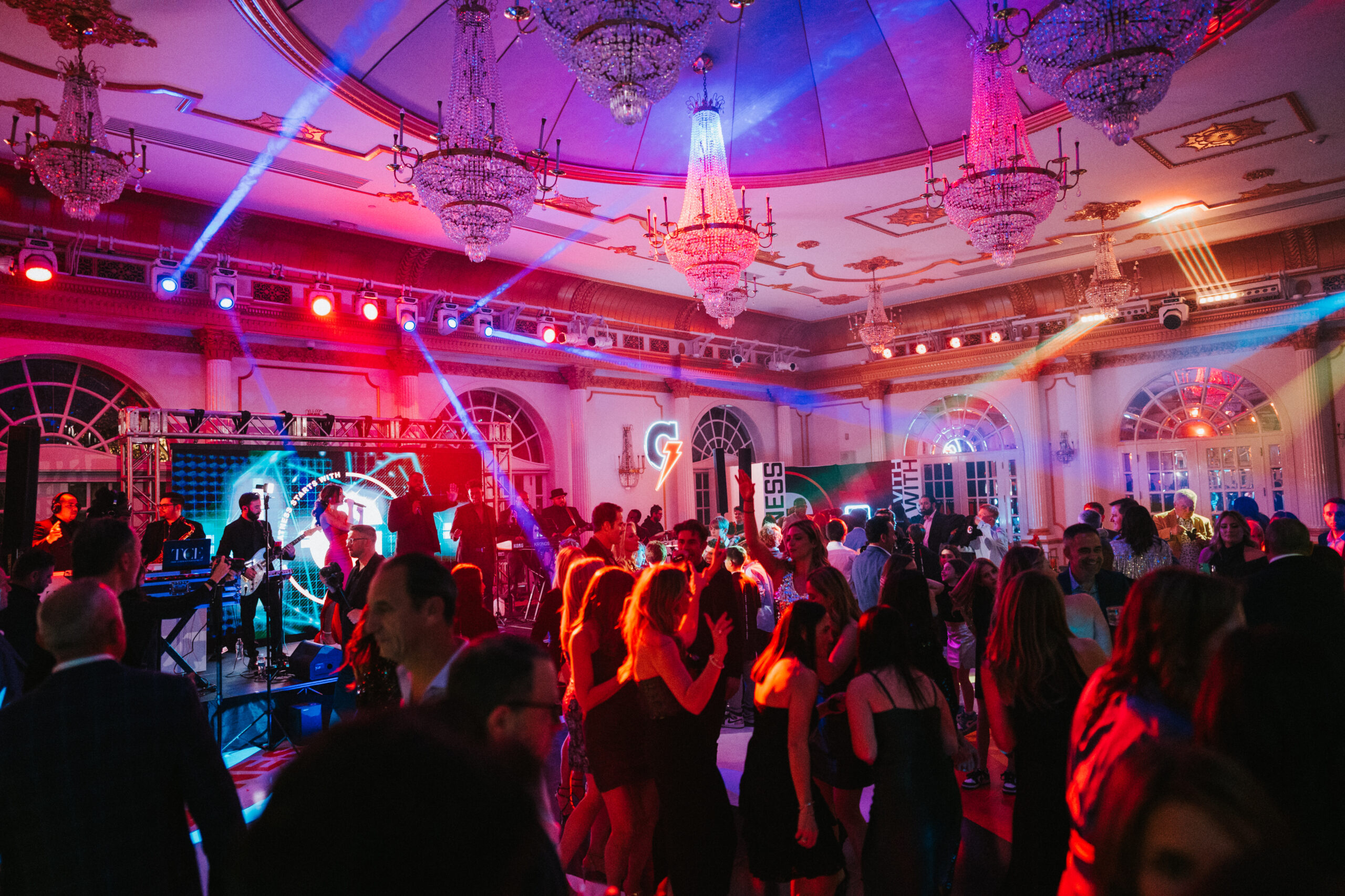 Guests dance to a live band in Crystal Plaza's Grand Ballroom.