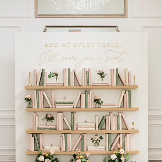 Creative book display of wedding guest names.